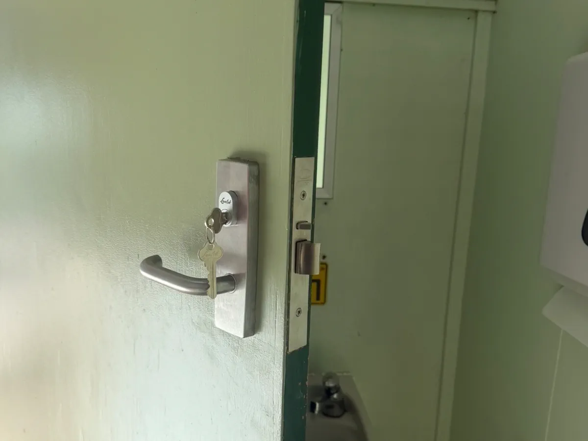 Bathroom door commercial maintenance project